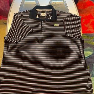 The cost sport, short sleeve polo, blue, white, and red stripes.